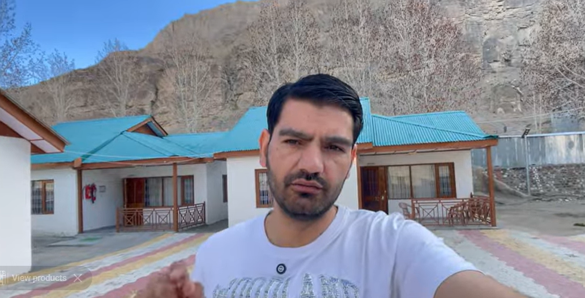Naveen standing outside the cottages at Hotel The Spiti Kaza