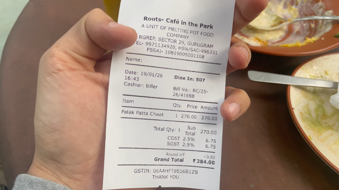 Roots Cafe Gurgaon receipt showing ₹284 total for Palak Patta Chaat