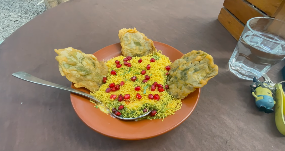 Palak Patta Chaat topped with sev and pomegranate at Roots Cafe Gurgaon