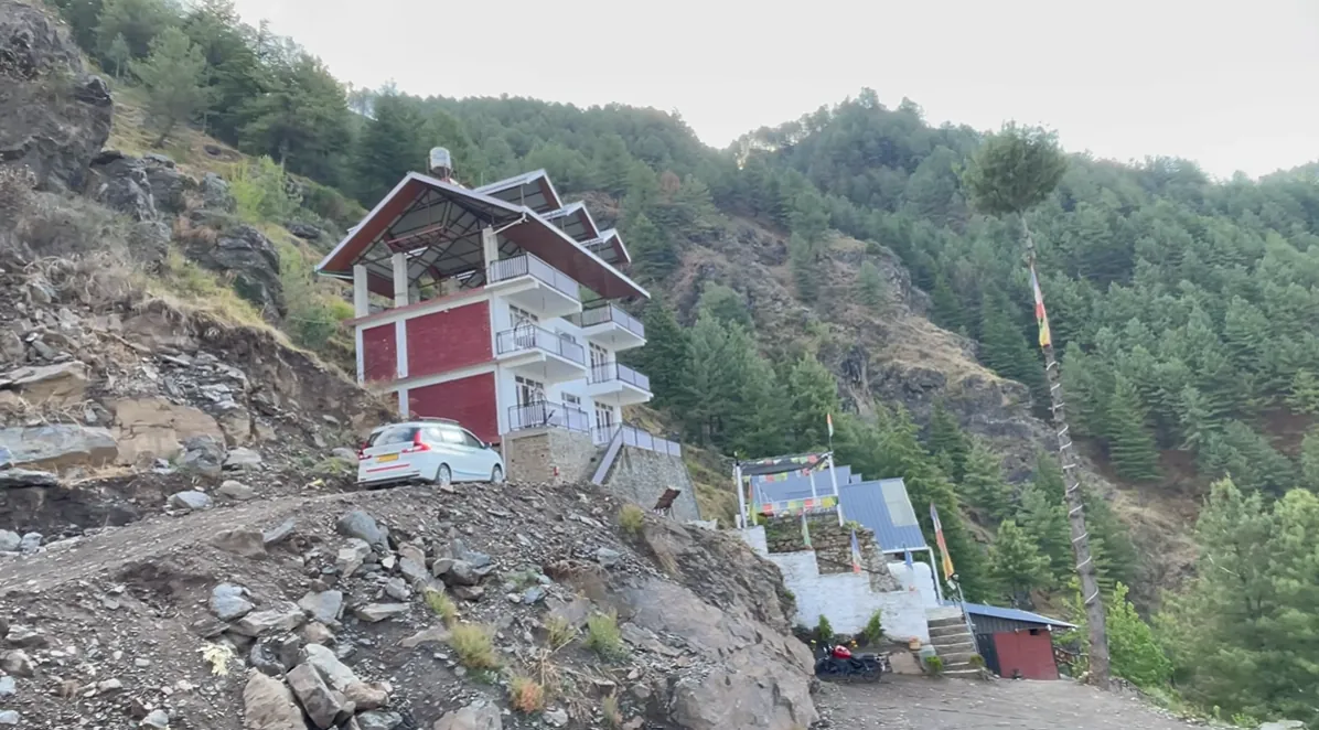 Gadegal Homestay building on a steep hillside near Shillaru