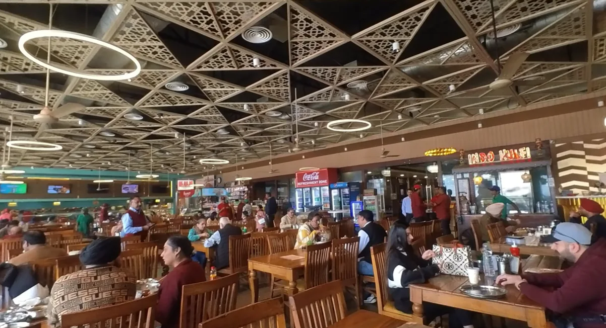 Busy dining hall inside Gulshan Dhaba Murthal