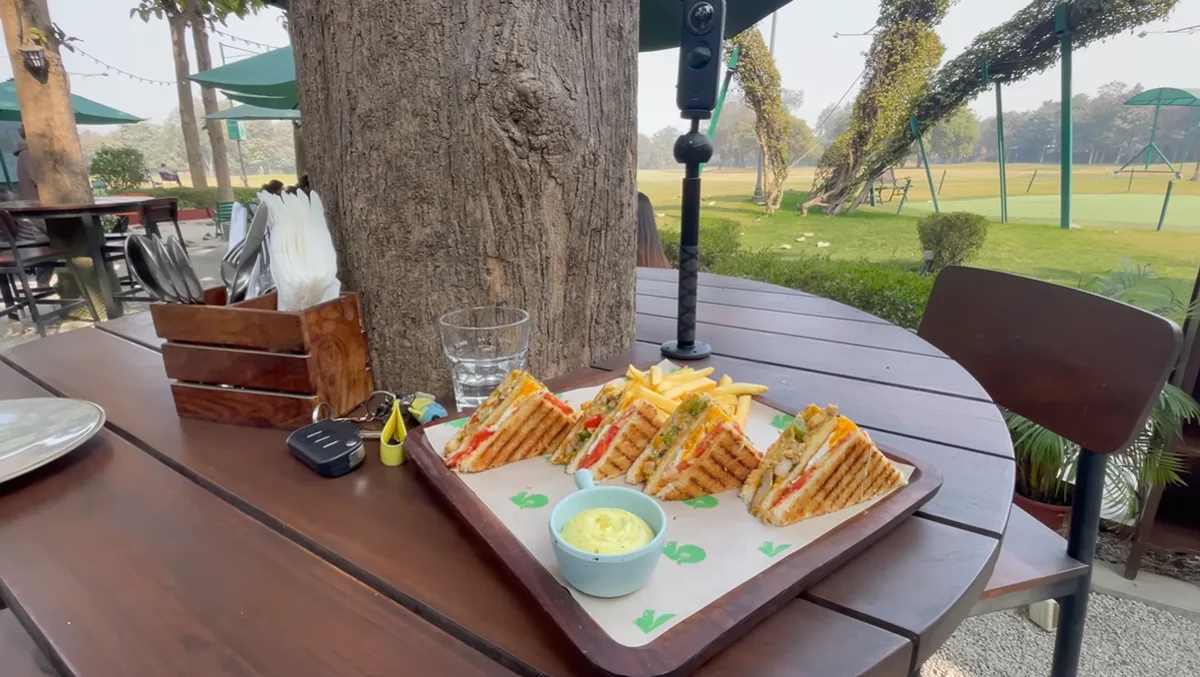 Chicken and egg club sandwich with fries at Hamoni Cafe
