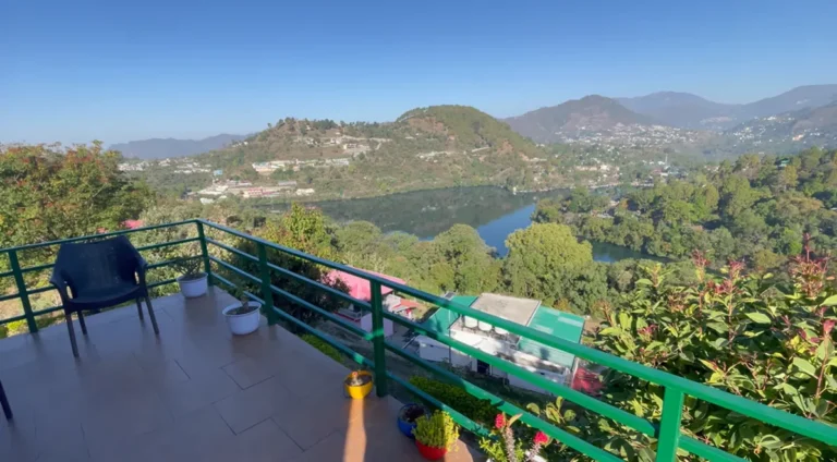 Naukuchiatal Lake and surrounding hills seen from a balcony