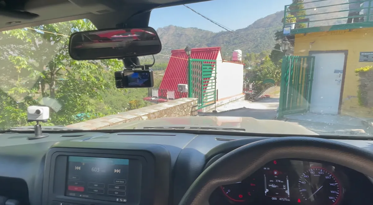Steep narrow exit road at our Naukuchiatal hillside stay