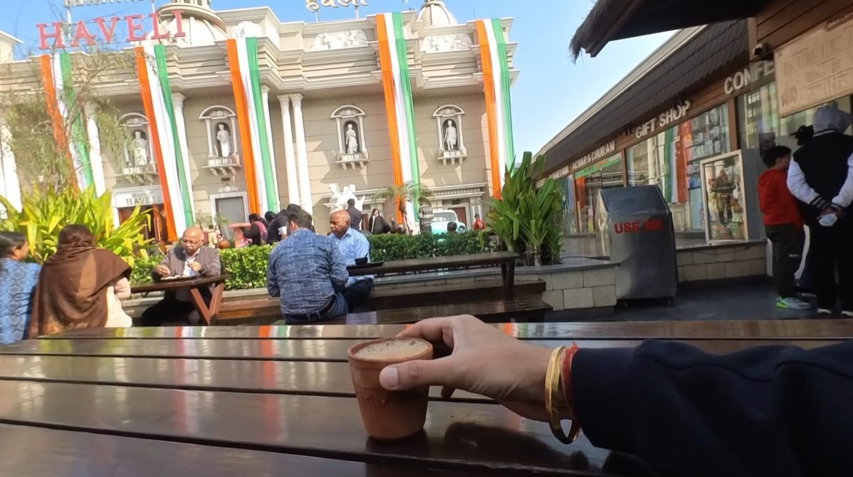 Tea in a clay cup at Mannat Haveli Murthal courtyard