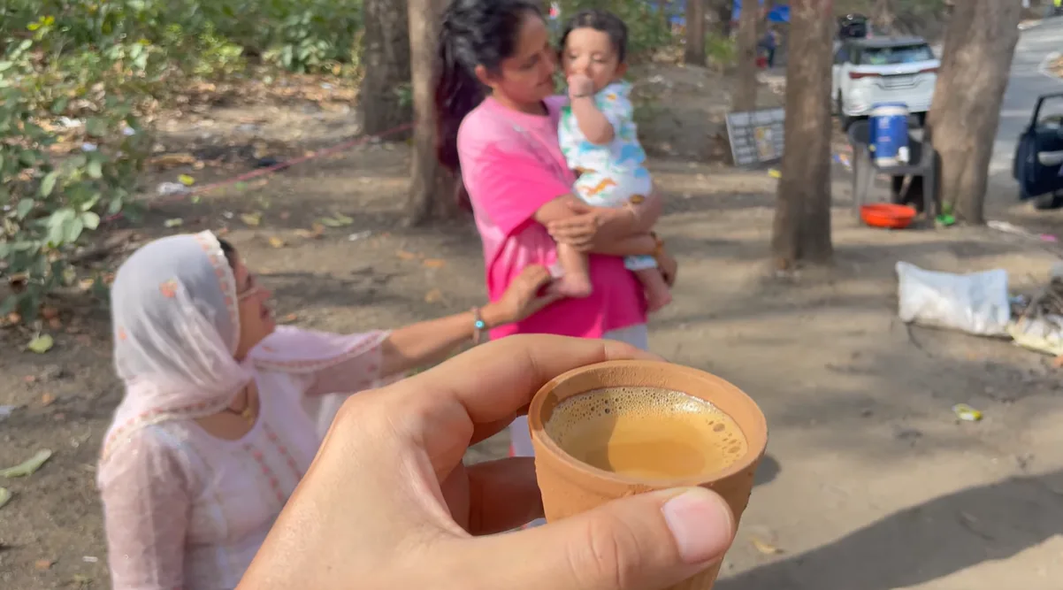 Tea break with our baby during the drive towards Naukuchiatal