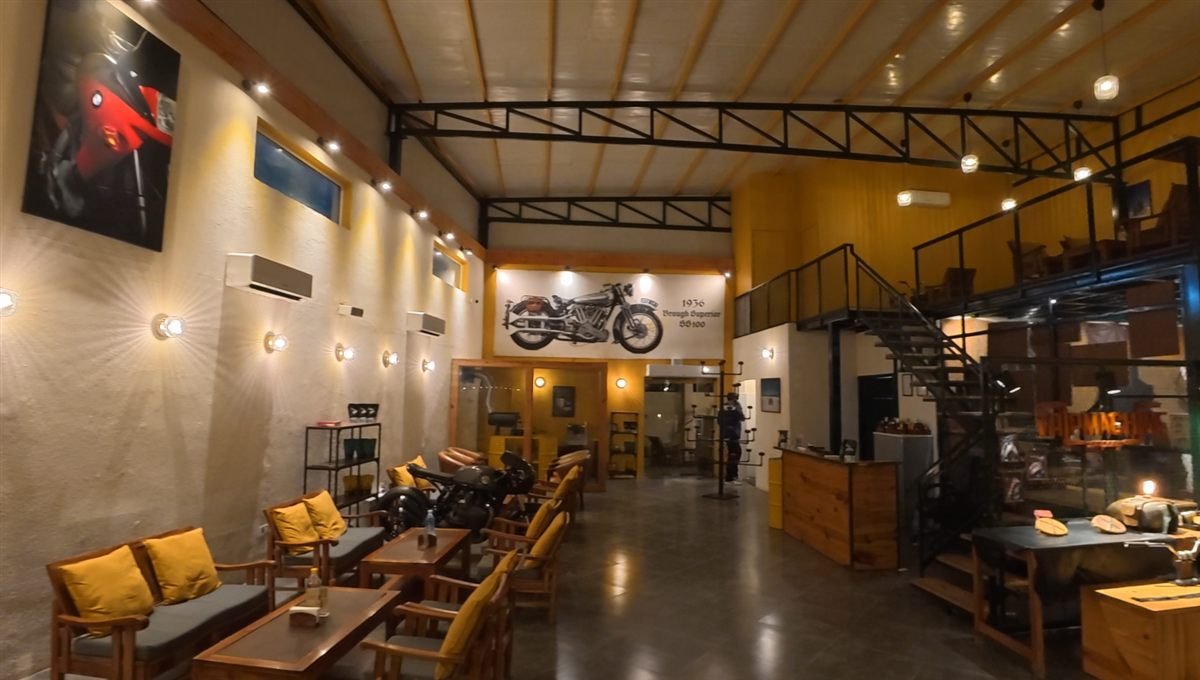 Seating area inside Trip Machine Cafe Gurgaon on the Faridabad Gurgaon road