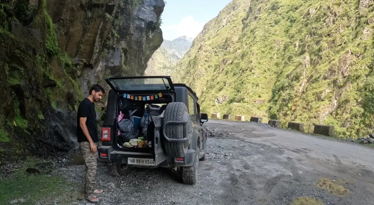 Our four-wheel-drive vehicle stopped on the rough mountain road