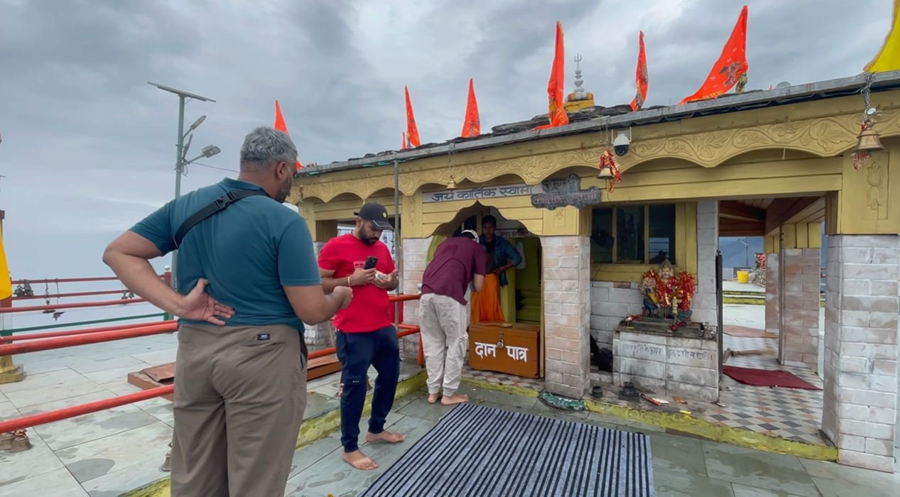 Our group outside Kartik Swami Temple after removing shoes