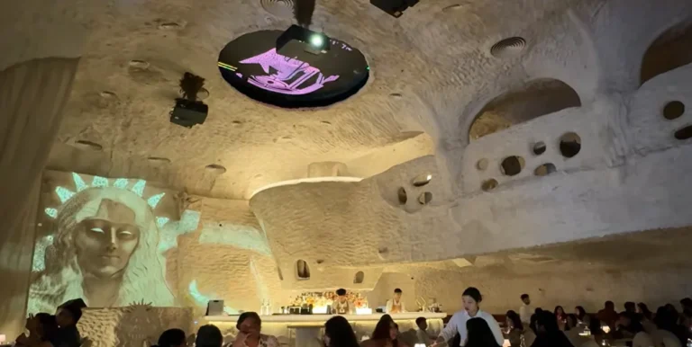 Projection-mapped cave-style interior and bar at Covah The Cavern Gurgaon