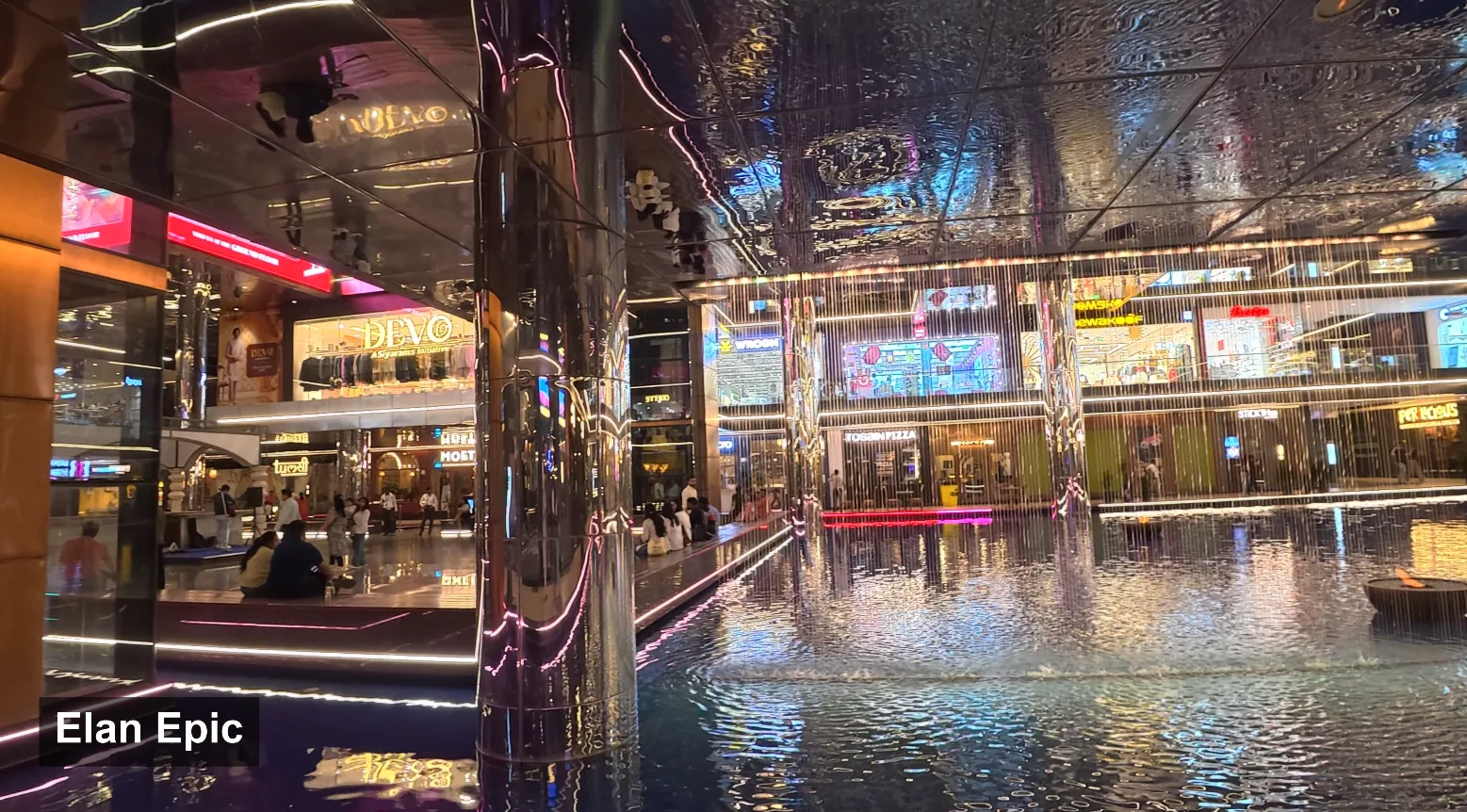 Reflective ceiling and cascading water inside Elan Epic Mall
