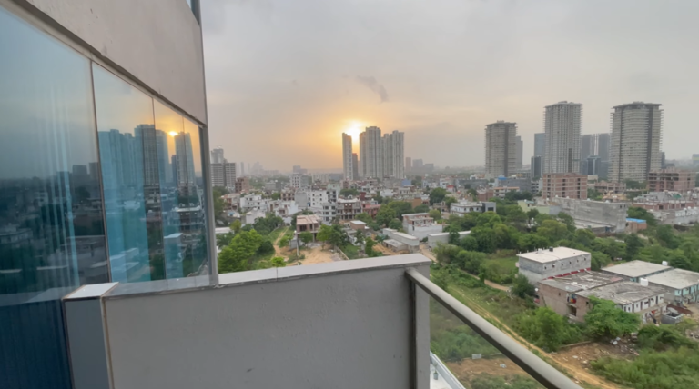 Sunset view over Gurgaon from the balcony at Citadines Paras Square