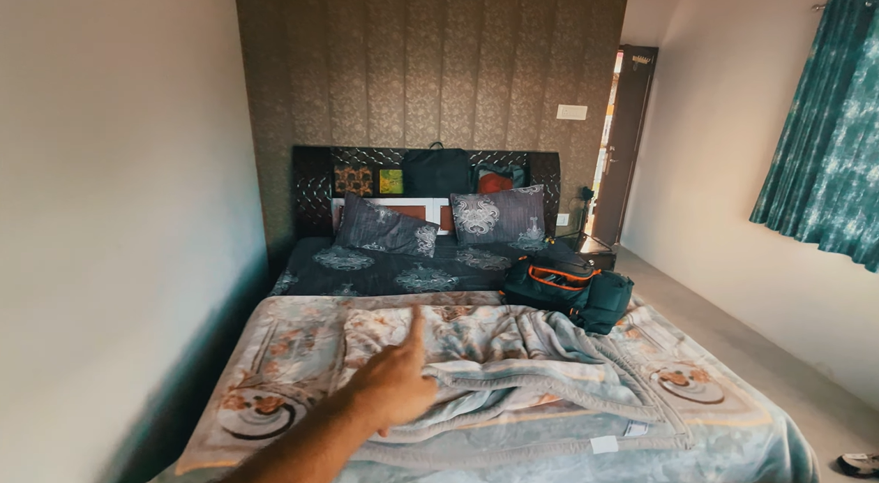 Double bed inside the Kanakchauri homestay room used by the creator's group