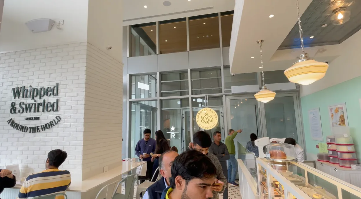 Magnolia Bakery Gurgaon interior with customers and limited seating